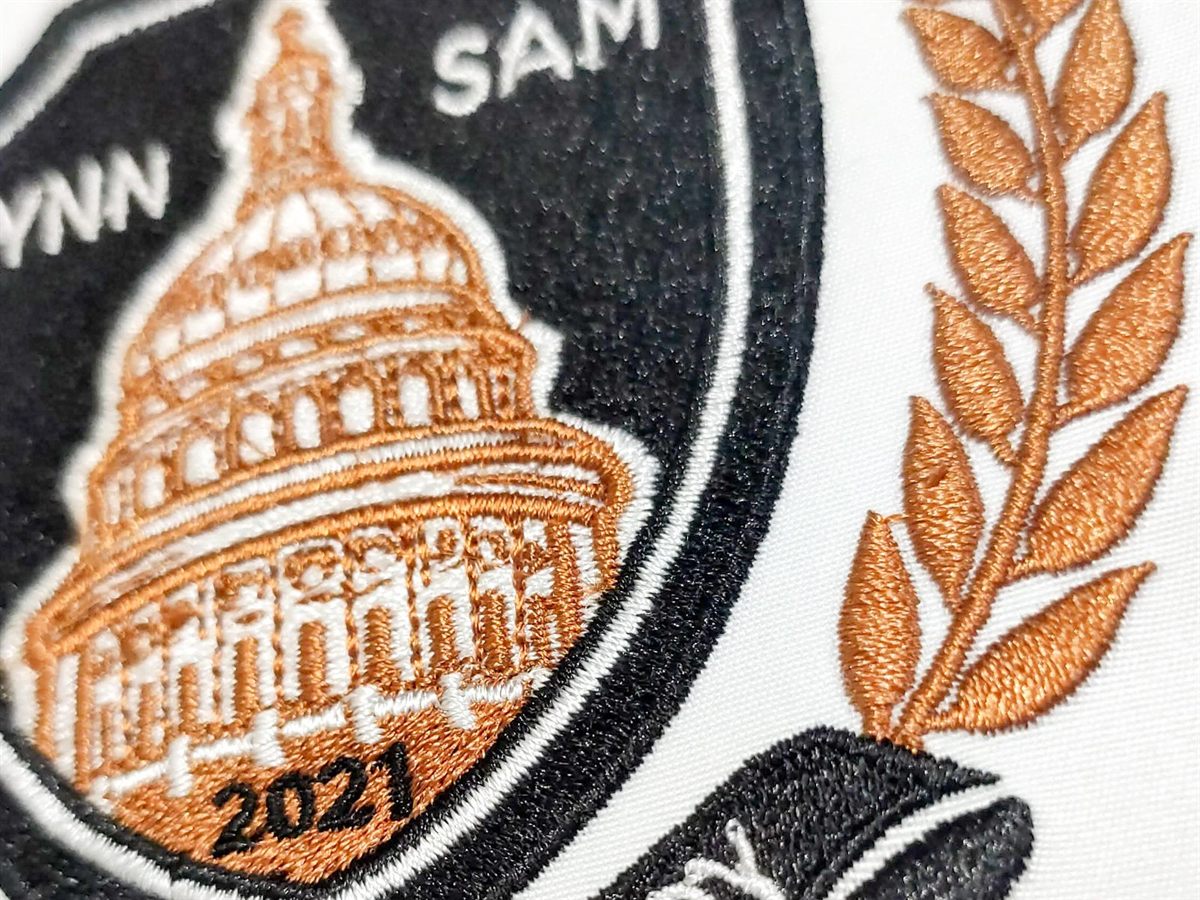 Large embroidered patch with the Capitol dome and wheat detail in copper thread